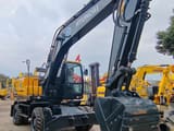 2024 Hyundai R210W-9 wheel excavator, front three-quarter view