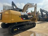 2012 Caterpillar 323DL crawler excavator, rear three-quarter view