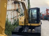 Caterpillar 308C crawler excavator, front view