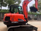 2024 Doosan DX60-9C mini excavator, side profile view