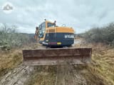 2016 Hyundai R235LCR-9A crawler excavator, rear view with blade