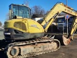 2006 Yanmar SV100 mini excavator, rear three-quarter view