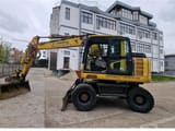 Komatsu PW148-8 wheel excavator, side profile view