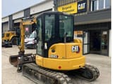 2021 Caterpillar 305E2 crawler excavator, rear three-quarter view
