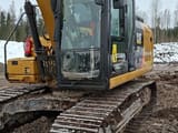 2017 Caterpillar 323F crawler excavator, side view of cab and tracks