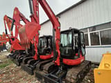 2023 Kubota U55-4 mini excavator, front three-quarter view