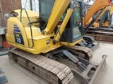 2013 Komatsu PC70 mini excavator, rear three-quarter view