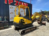 2015 Kubota KX61-3 mini excavator, rear three-quarter view