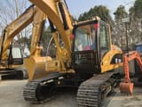 2023 Caterpillar 320CL Kettenbagger, frontale Dreiviertelansicht