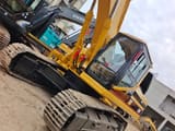 2024 Caterpillar 330BL crawler excavator, low-angle side view