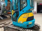 2022 Kubota U-25S mini excavator, rear three-quarter view