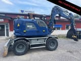 Liebherr 910 Compact wheel excavator side view
