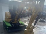 2020 Caterpillar 303E mini excavator, front three-quarter view