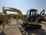 2024 Komatsu PC40 mini excavator, side profile view