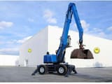 2016 Fuchs MHL350 material handler, side view