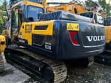 2018 Volvo EC210 crawler excavator, rear three-quarter view