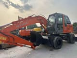 2023 Hitachi Zaxis 130 wheel excavator, side profile view