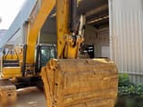 2022 Caterpillar 333 crawler excavator, close-up of bucket and boom