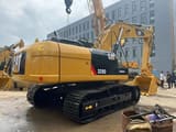 Caterpillar 329D crawler excavator rear three-quarter view
