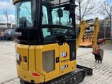 2022 Caterpillar 301.8 mini excavator, rear three-quarter view