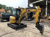 2023 Caterpillar 303GR mini excavator, front three-quarter view