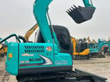 Kobelco SK75 Super mini excavator, side view