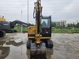 2022 Caterpillar 305.5E2 mini excavator, front view