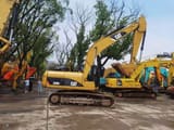 2018 Caterpillar 320D2 rupsgraafmachine, zijaanzicht