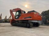 2023 Doosan DX225LCA crawler excavator, rear three-quarter view