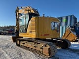 2020 Caterpillar 325-07A crawler excavator, rear three-quarter view