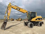 2006 Caterpillar M315C wheel excavator, side profile view
