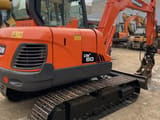2016 Doosan DX60 crawler excavator, rear three-quarter view