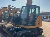 2024 Caterpillar 307.5 mini excavator, front three-quarter view