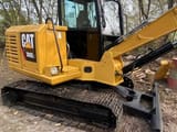 2022 Caterpillar 306E2 mini excavator, side view
