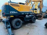 2018 Hyundai 210W-9 wheeled excavator, rear three-quarter view