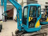 Kubota U25 mini excavator, three-quarter front view