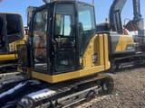 2023 Caterpillar 307.5 mini excavator, side view