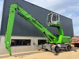 2012 Sennebogen 825 material handler side view