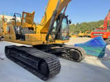 2023 Caterpillar 330GC crawler excavator, rear three-quarter view