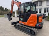 2024 Hitachi Zaxis 65USB mini excavator, rear three-quarter view