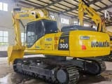2023 Komatsu PC300-7 crawler excavator, rear three-quarter view