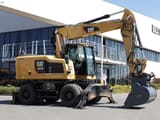 2016 Caterpillar M318F wheel excavator, side profile view