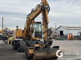 2004 Liebherr A312 Litronic wheel excavator, front three-quarter view