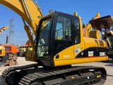 Koparka gąsienicowa Caterpillar 320CL z 2014 roku, widok z boku
