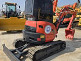2024 Kubota U35 mini excavator, front three-quarter view