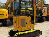2023 Caterpillar 302CR mini excavator, front three-quarter view