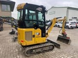2022 Caterpillar 301.8-05A mini excavator, rear three-quarter view