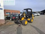 2024 JCB 403PLUS mini excavator, front three-quarter view