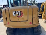 2023 Caterpillar 305.5 mini excavator, rear view