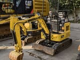 2022 Komatsu PC15MR mini excavator, front three-quarter view